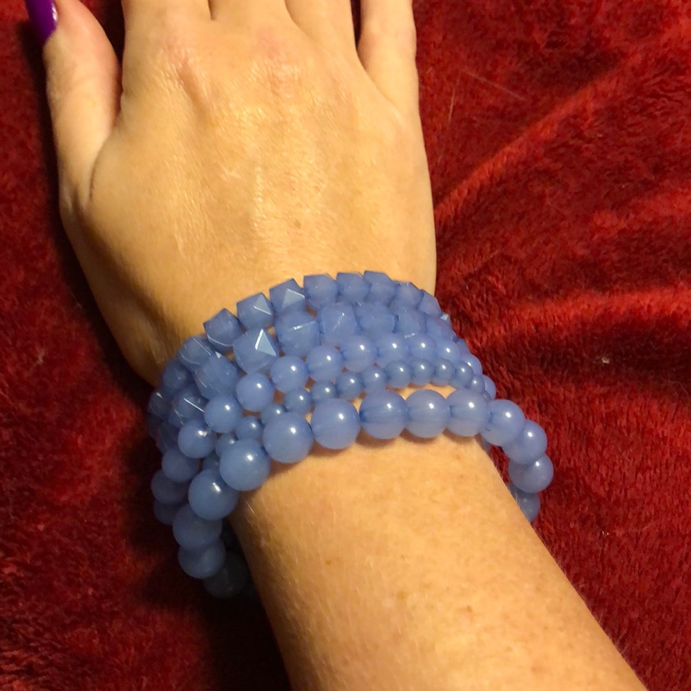Multiple periwinkle bracelets